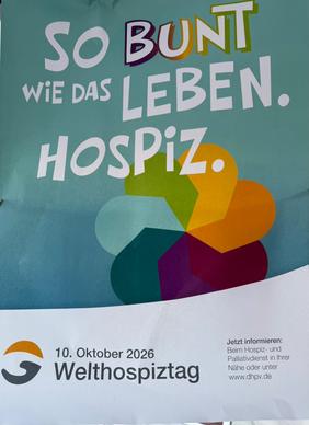 Werbe-Plakat mit der Aufschirft "So bunt wie das Leben. Hospiz."